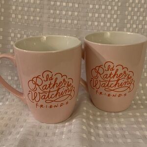 Two Pink Friends themed mugs, I’d Rather Be Watching Friends, 4 inches tall.